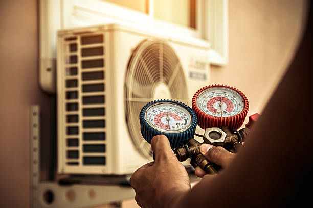 Professional Hvac technician working in Wetumpka, AL